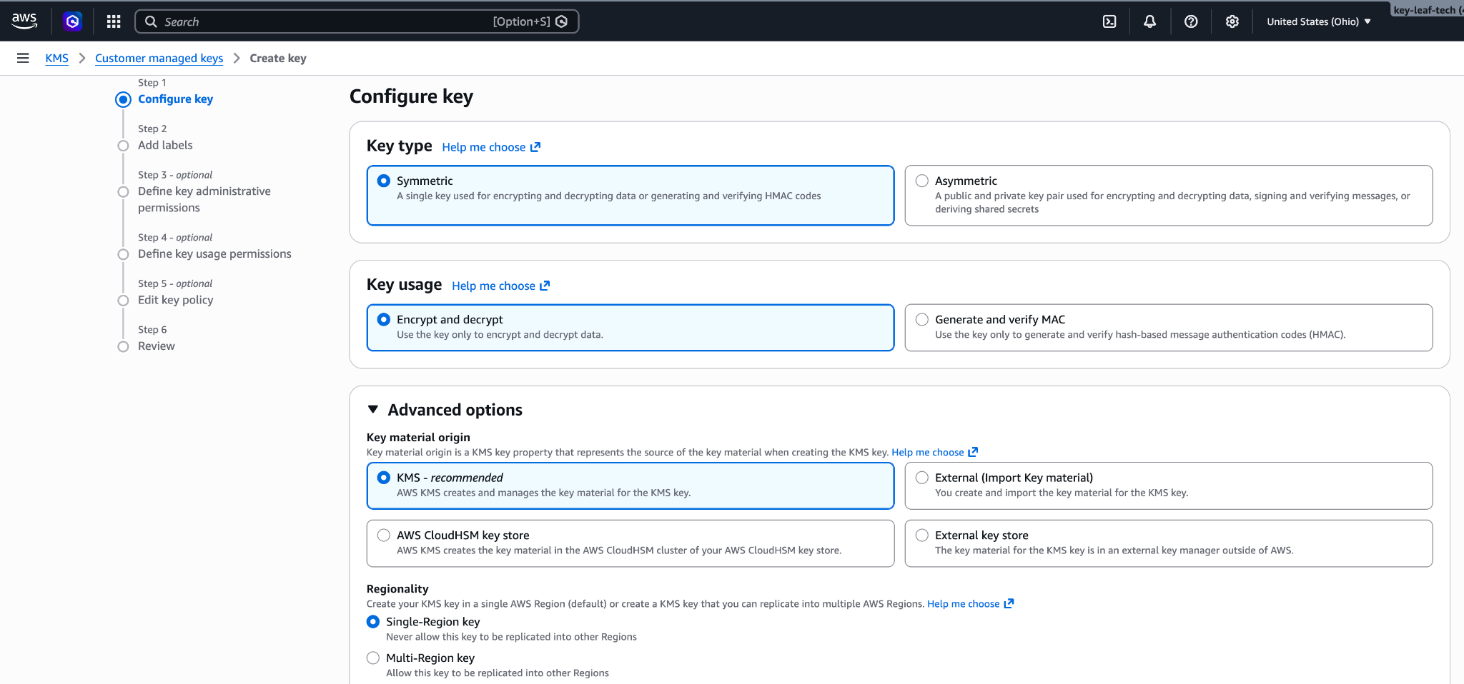AWS KMS Create key wizard on the Configure key step, with Symmetric key type, Encrypt and decrypt key usage, and Single-Region key selected.